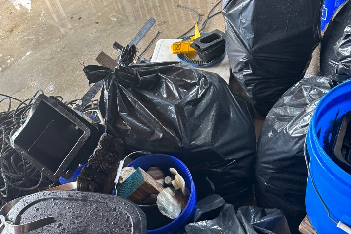 a motorcycle parked in front of a blue bag